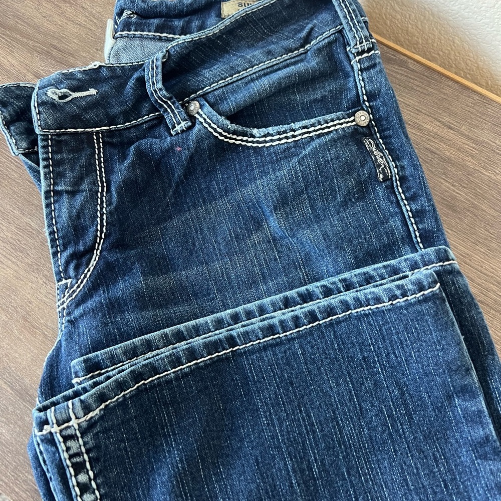 Women’s silver boot cut jeans